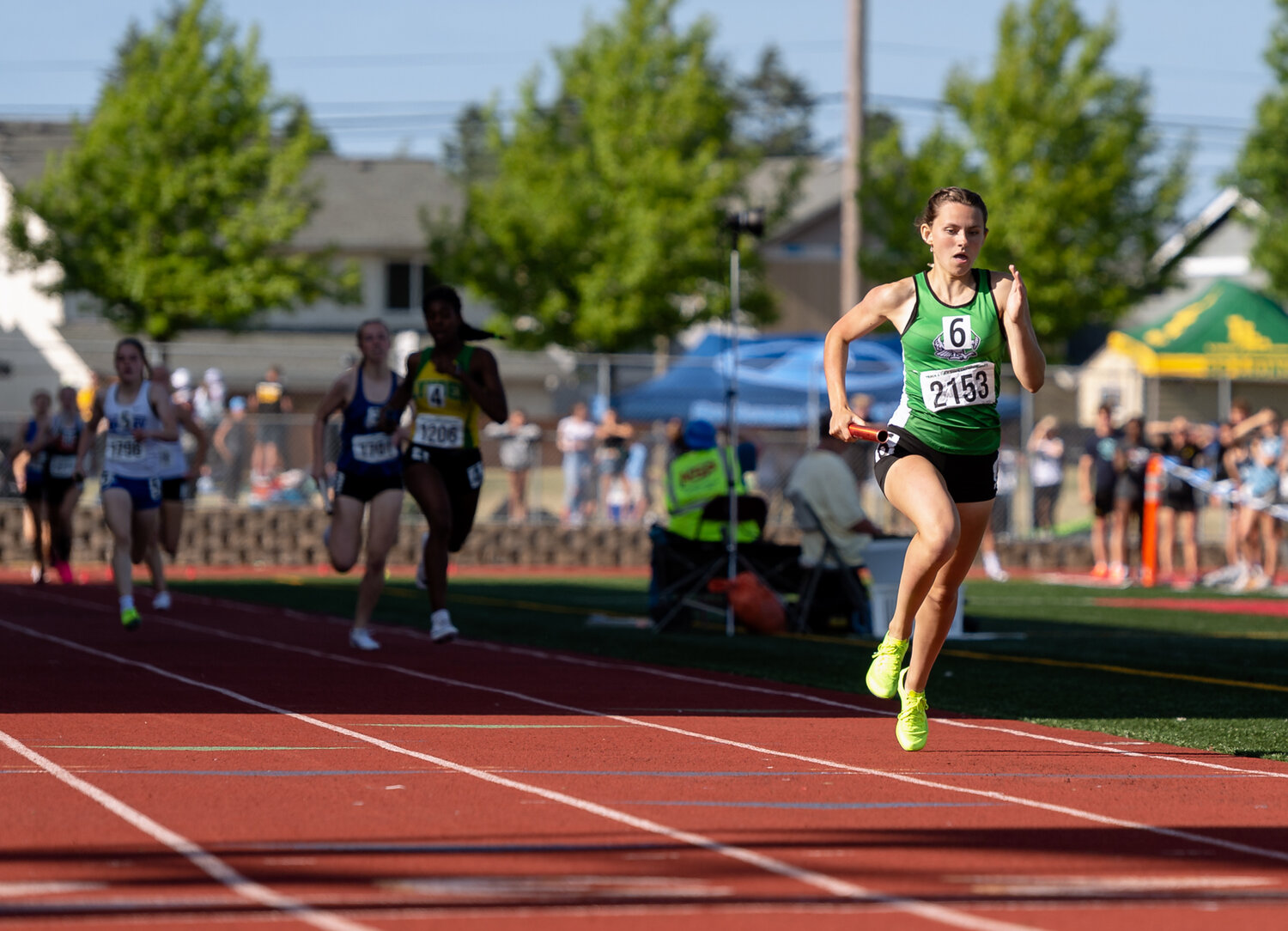 Tumwater’s Annabelle Clapp leads the field into the finish line as the T-Birds won the 4x400 relay at the WIAA 2A/3A/4A State Track and Field Championships on Saturday, May 27, 2023, at Mount Tahoma High School in Tacoma. (Joshua Hart/For The Chronicle)